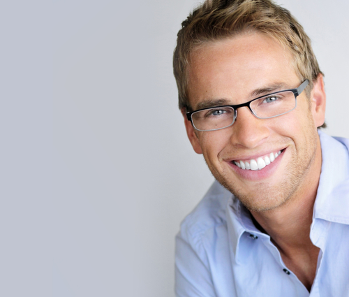 man smiling confidently after Westmont teeth whitening