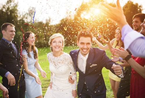 couple walking down the aisle during wedding