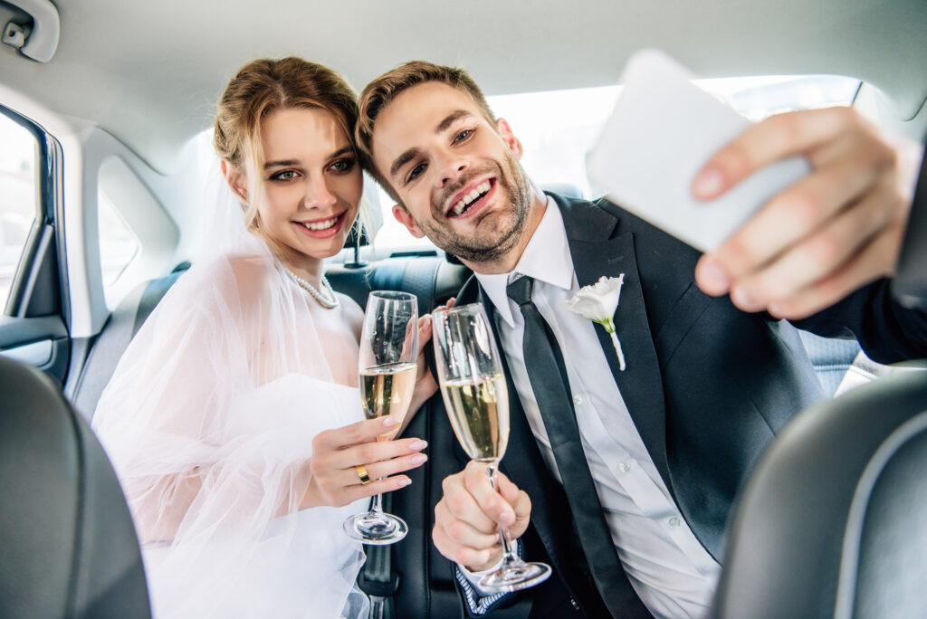 Couple getting married with bright white smiles.